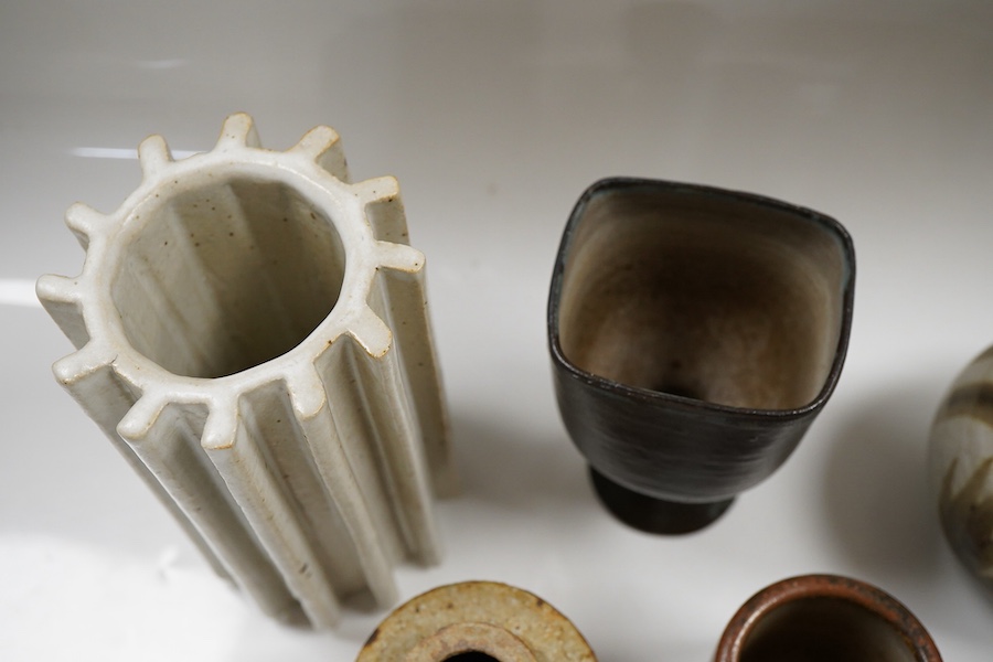 Assorted studio pottery comprising six vases and a goblet, largest 15cm high